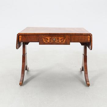 Drop-leaf table, Empire style, mid-19th century.