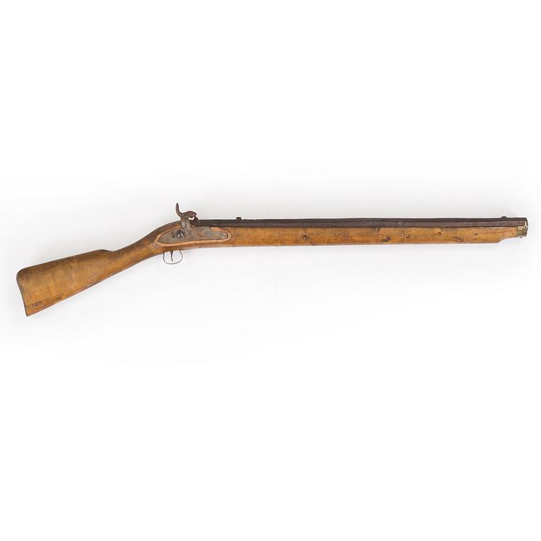 A percussion lock rifle, mid 20th century.