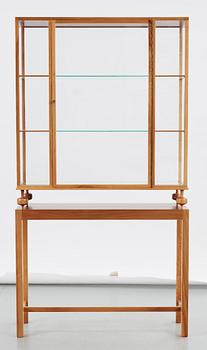 A Josef Frank walnut showcase cabinet, Svenskt Tenn, model 2077.