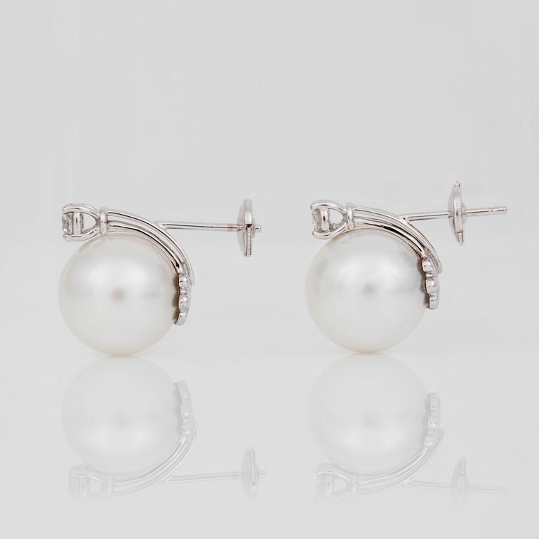 A pair of cultured South Sea pearl, Ø 14.4 mm, and diamond circa 0.50 ct in total, earrings.