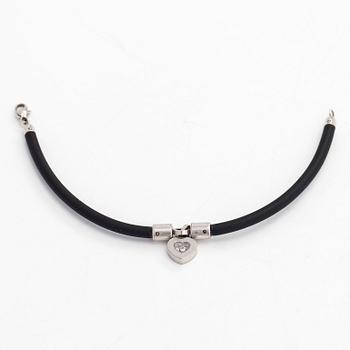 Chopard, armband, "Happy Diamonds", 18K vitguld, gummi och en diamant 0.05 ct.