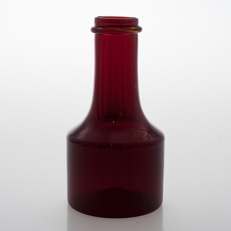 TAPIO WIRKKALA, A red glass bottle for Iittala, signed Tapio Wirkkala i 408.