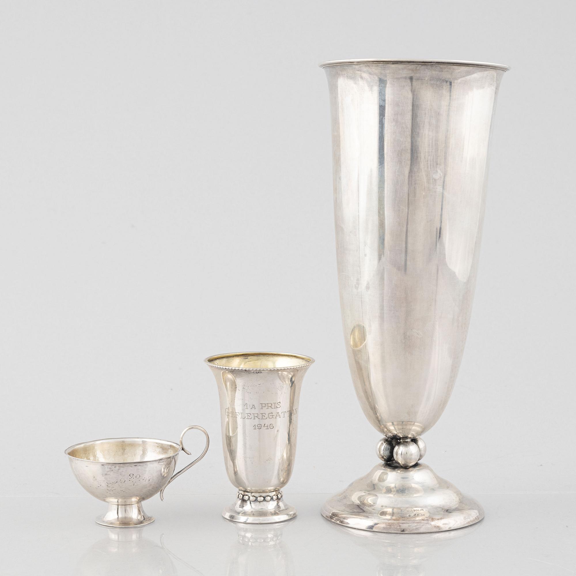 Two silver vases and a punch cup, one by W.A. Bolin, Stockholm 1929.