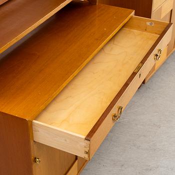 Josef Frank, two mahogany veneered bokkshelves, model 2112, Firma Svenskt Tenn, Sweden.