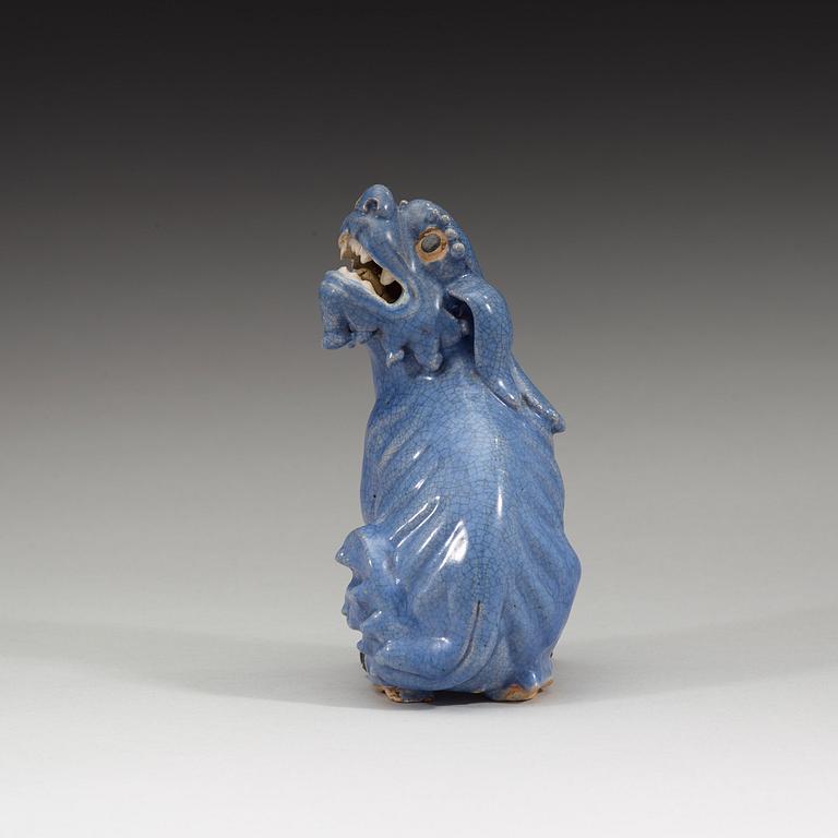 A blue glazed figure of a buddhist lion, Qing dynasty, Qianlong (1736-95).