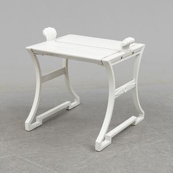 A "Sneckan" bench by Folke Bensow for Byarums bruk in the late 20th century.