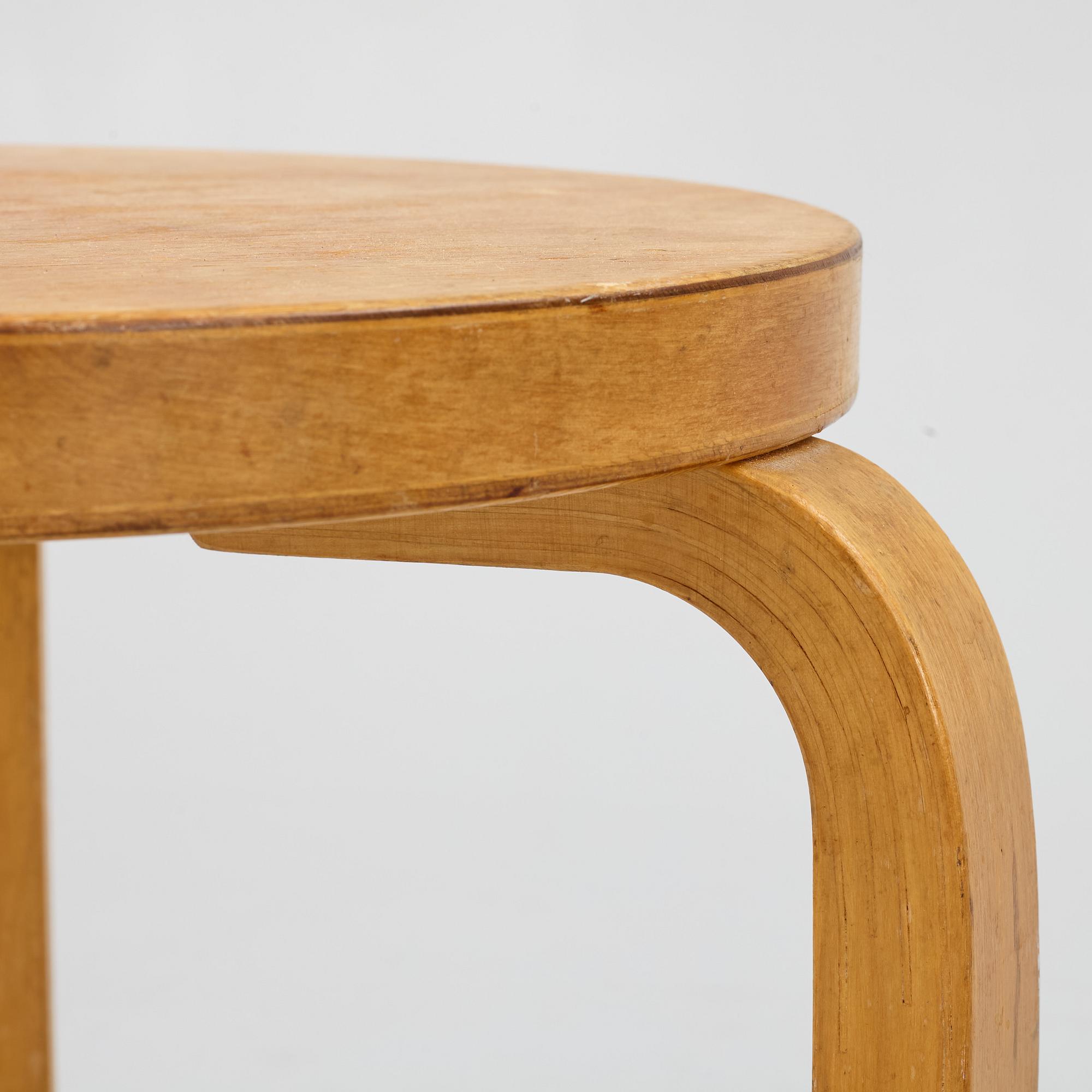 Alvar Aalto, a pair of model 60 stools, Artek, mid 20cth century.