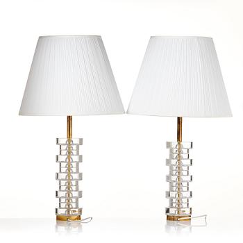 Carl Fagerlund, two glass and brass table lamps, model "RD 1986", Orrefors Sweden, 1960-70s.