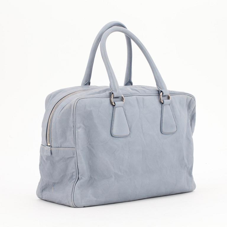 PRADA, a pale blue leather purse.