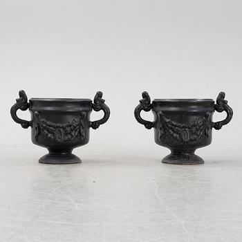 A pair of cast iron urns, Stavsjö Bruk, Sweden.