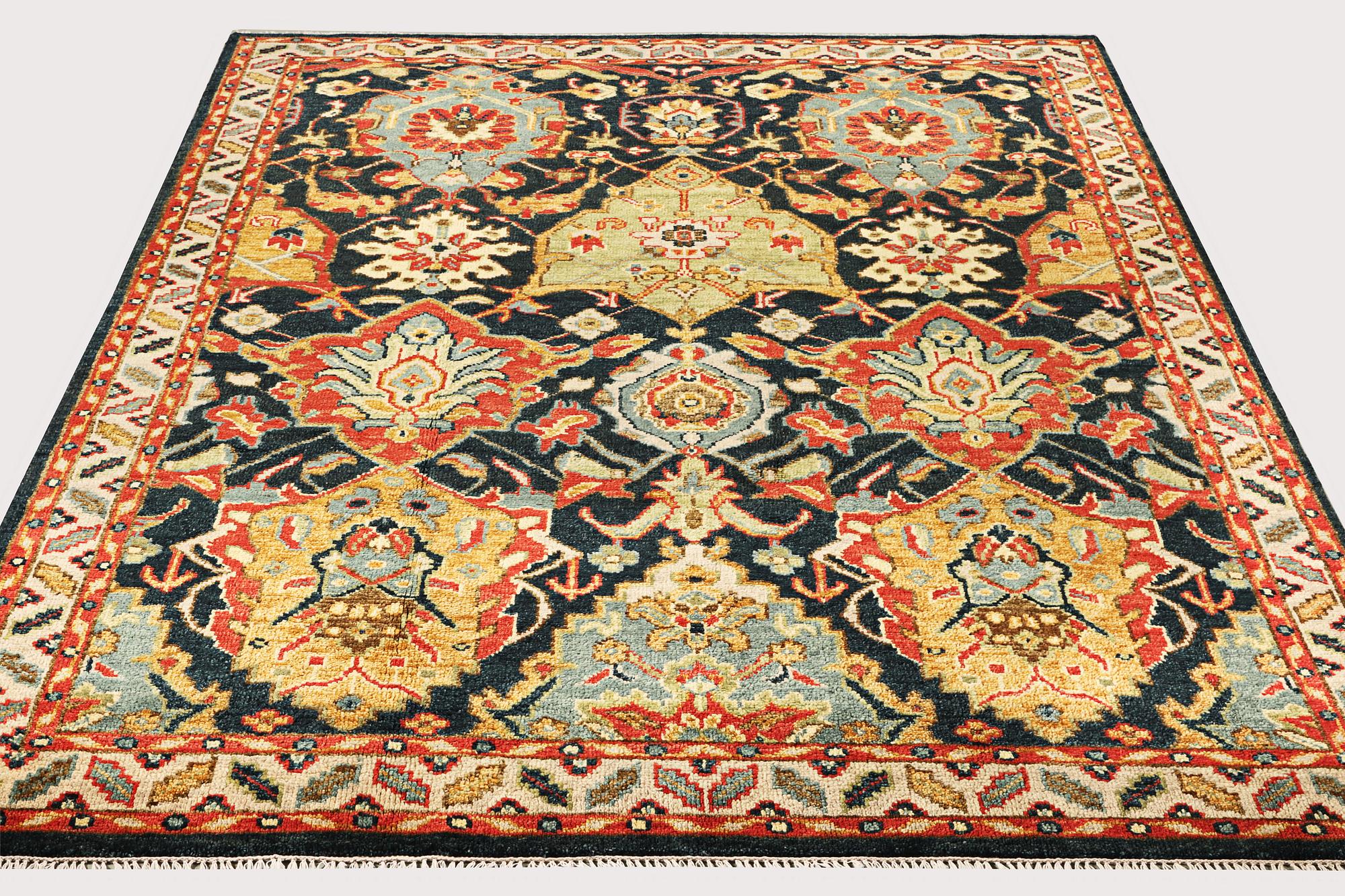 An oriental carpet with Mamluk design, a. 331 x 274 cm.