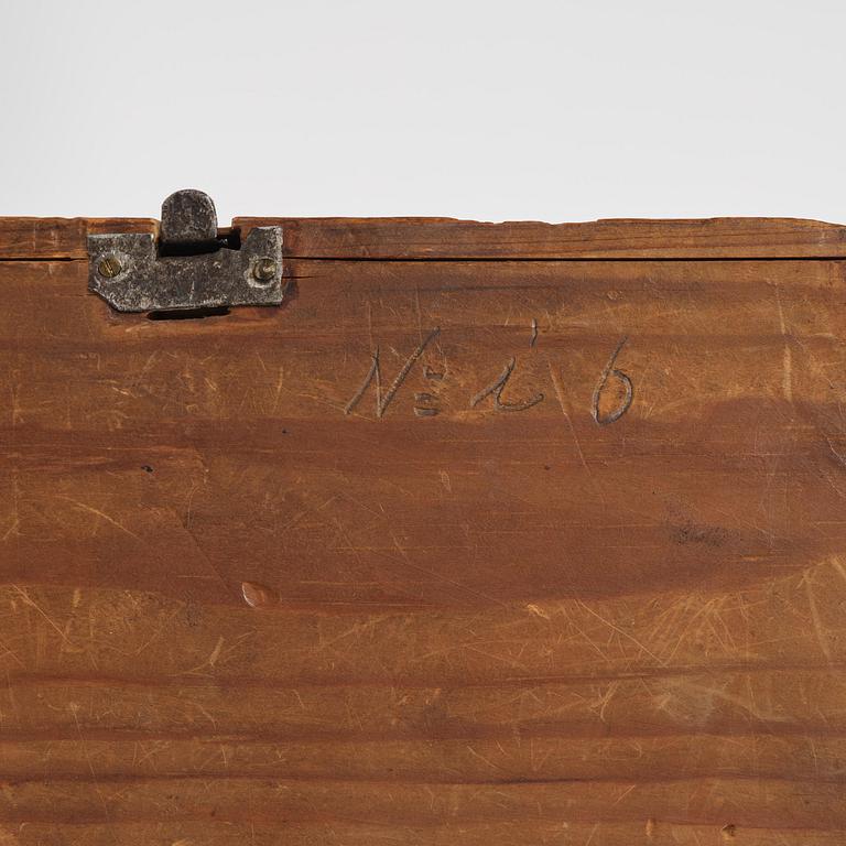 A Northern European mahogany miniature commode, early 19th century.