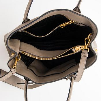 Prada, a clay gray leather handbag, 2020.