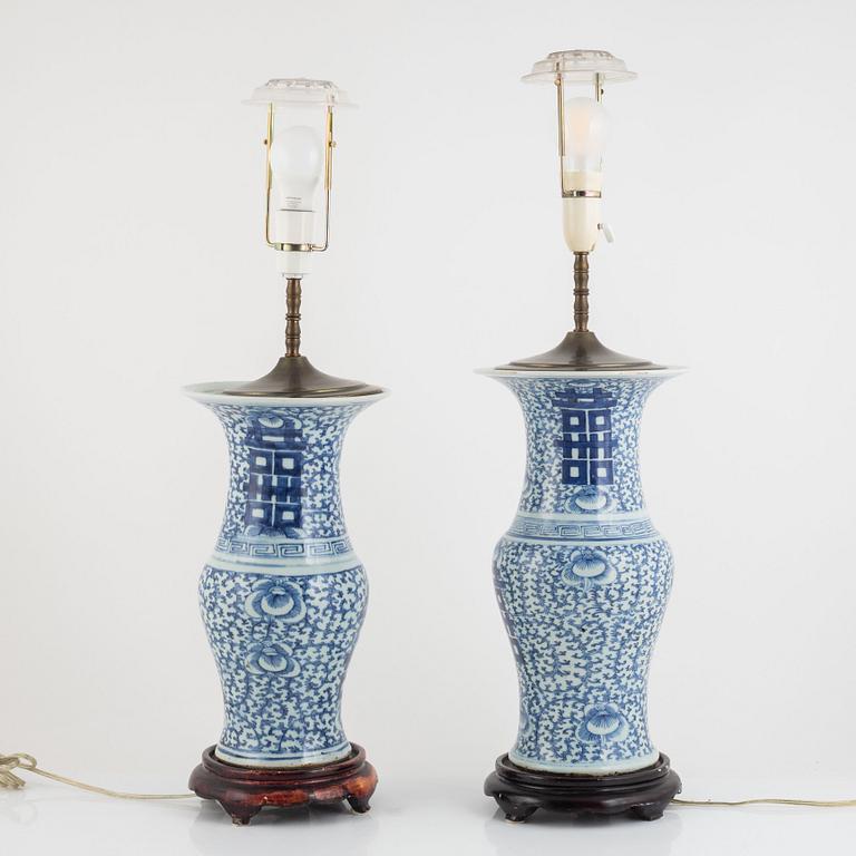 A pair of Chinese porcelain table lamps, early 20th Century.