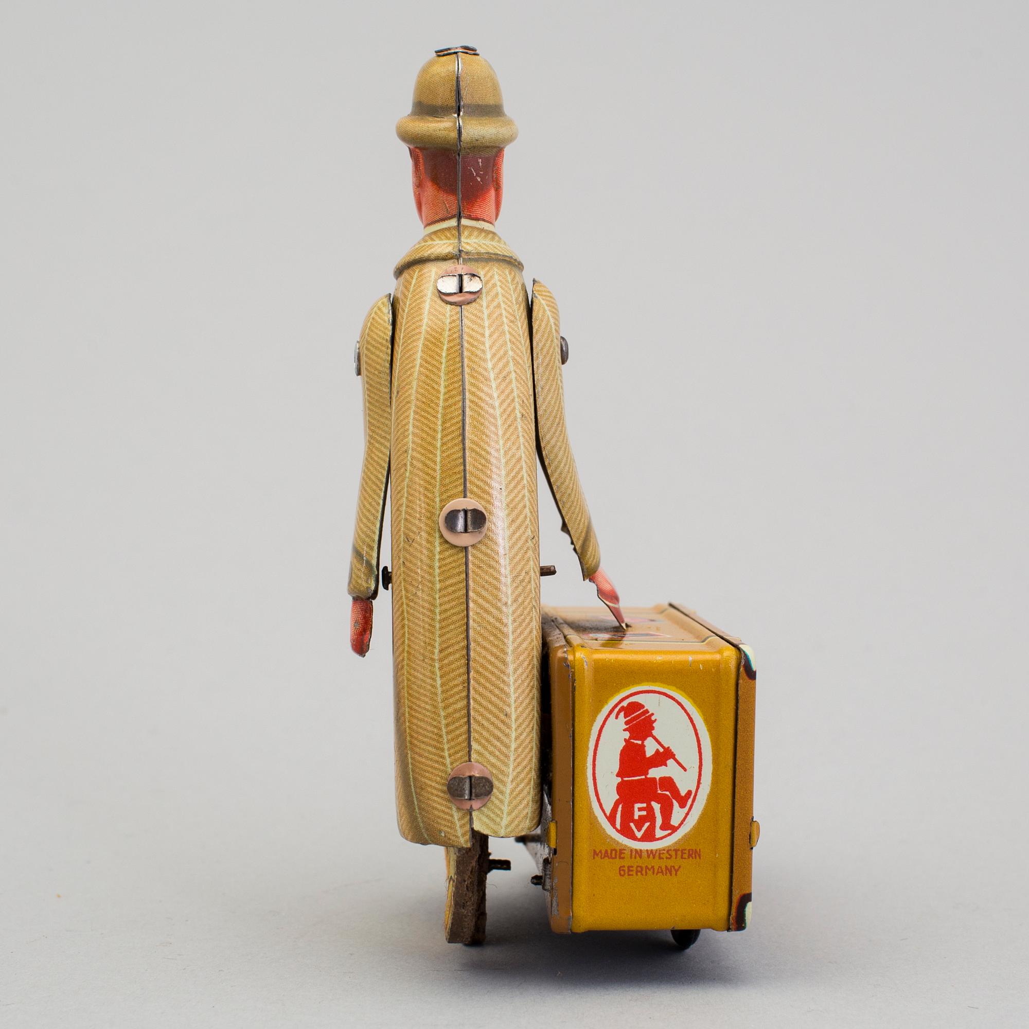 A tinplate Fritz Voith man with suitcase, Germany, 1950s.