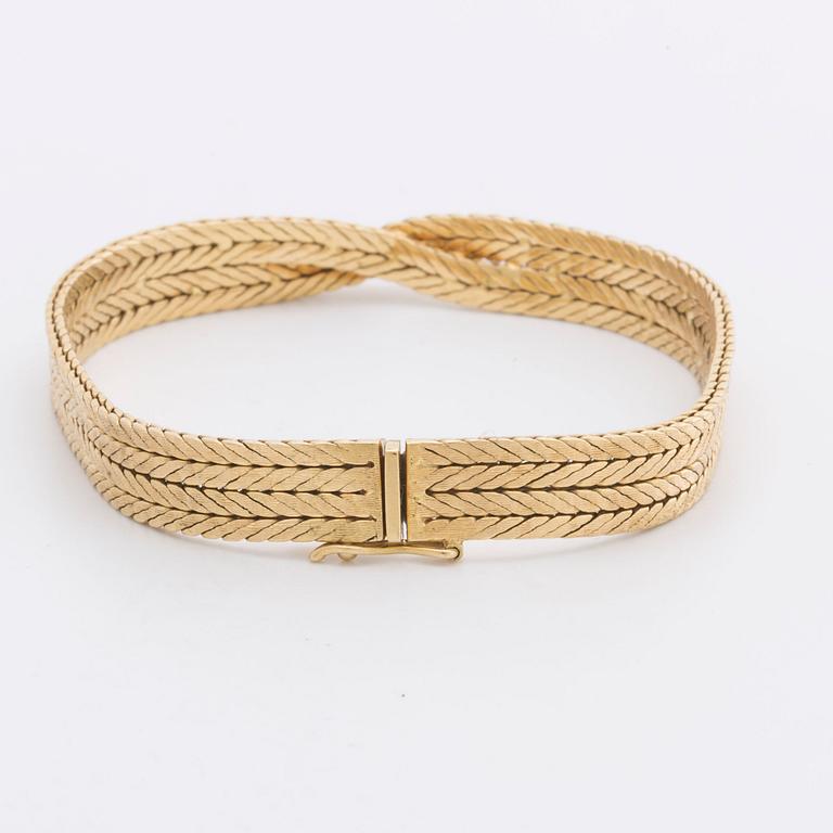 BRACELET 18K gold w 9 brilliant-cut diamonds approx 0,45 ct in total.