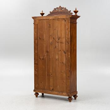 A mahogany veneered book cabinet ,second part of the 19th Century.