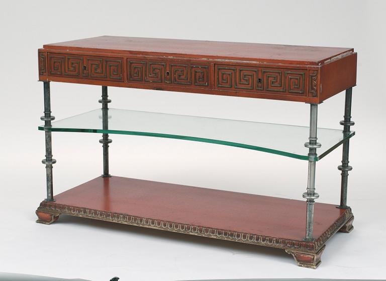 An Axel-Einar Hjorth red lacquered console table "Åbo" with silverplated brass legs, a glass shelf, Nordiska Kompaniet 1929-30.