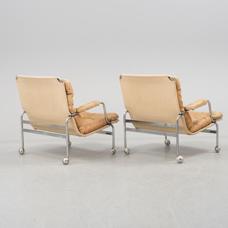 BRUNO MATHSSON, A pair of late 20th century, 'Karin' armchairs for Dux.