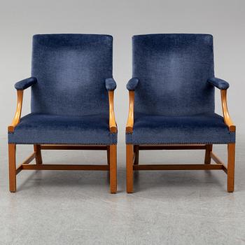 A mid 20th Century pair of oak armchairs attributed to Carl Malmsten.