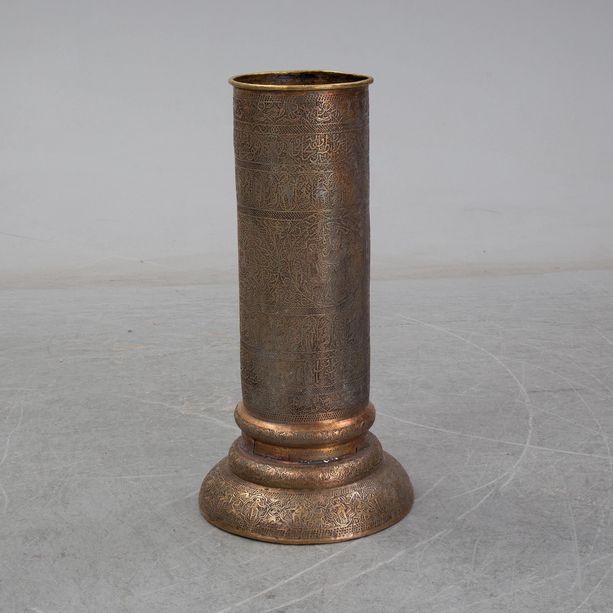 A UMBRELLA STAND FROM AROUND THE YEAR 1900.