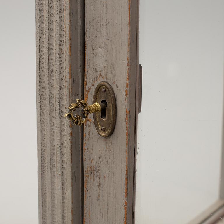 A late 19th century painted display cabinet.