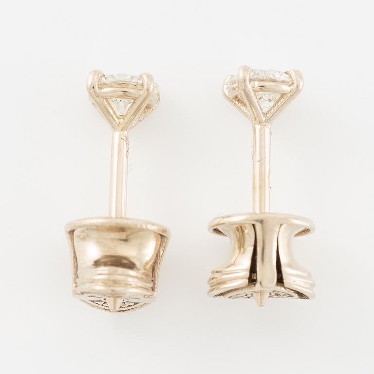 Earrings, a pair, 18K gold with brilliant-cut diamonds.