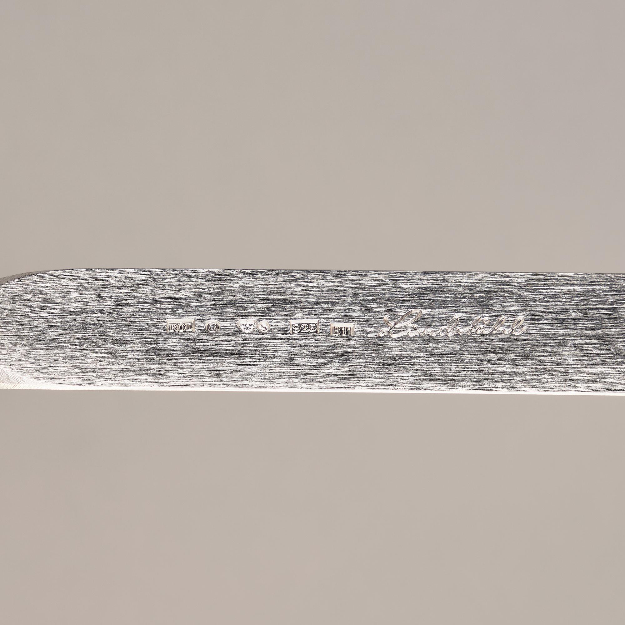 A sterling silver letter knife, mark of Rolf Lindståhl, Stockholm 2000.