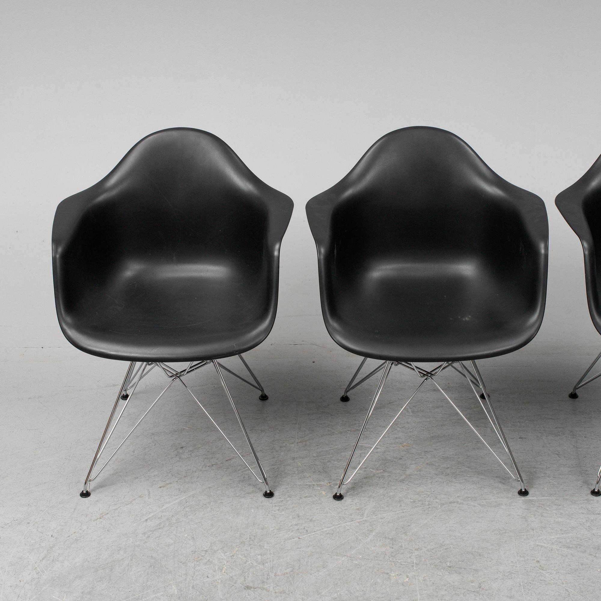 CHARLES AND RAY EAMES,  4  Eames Plastic Armchair, Vitra 2010.