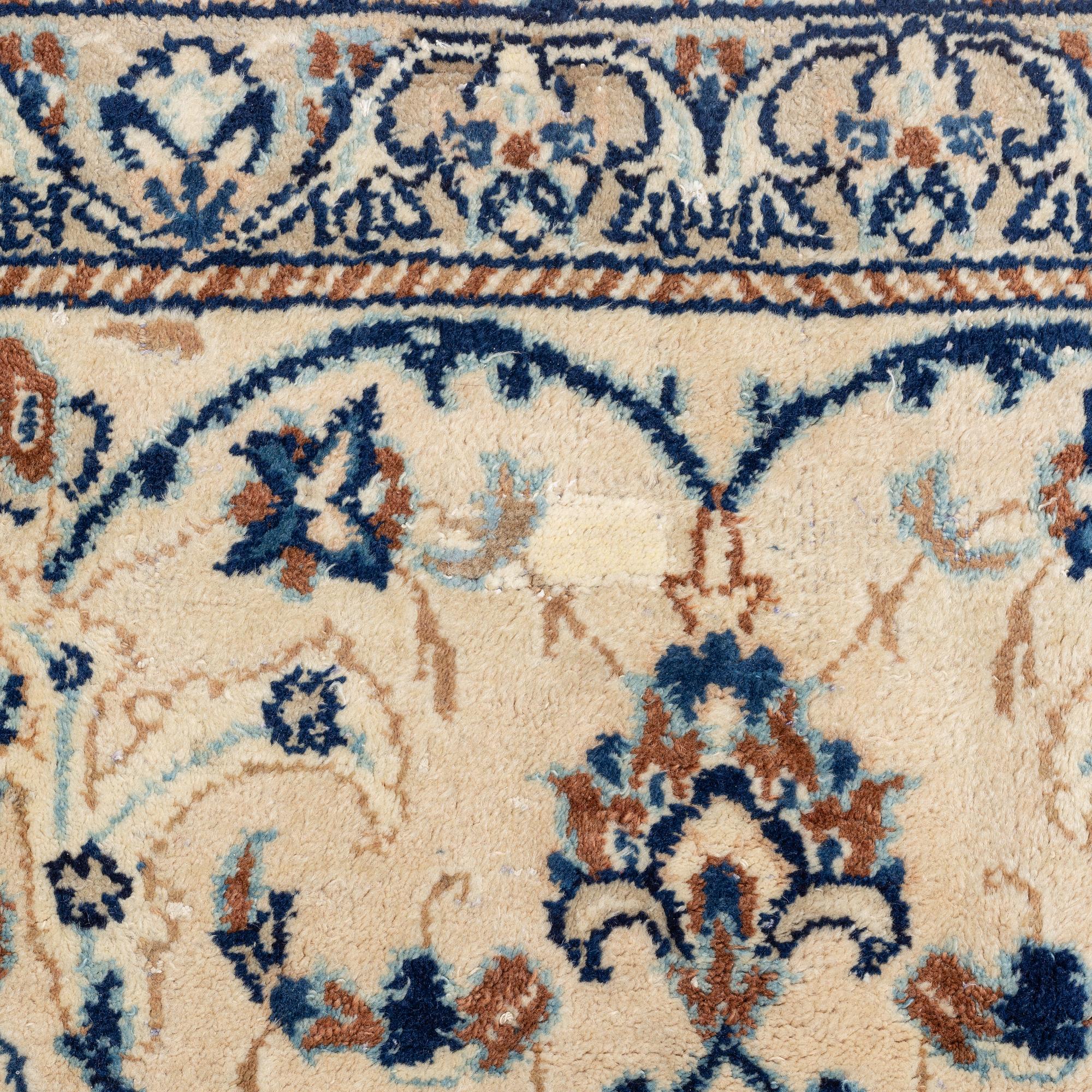 A carpet, possibly Yasd, c. 459 x 309 cm.