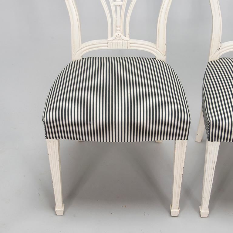 Four George III style chairs, early 20th century.