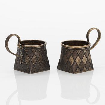 Petr Loskutov, a pair of parcel-gilt charka silver cups, Moscow 1885.