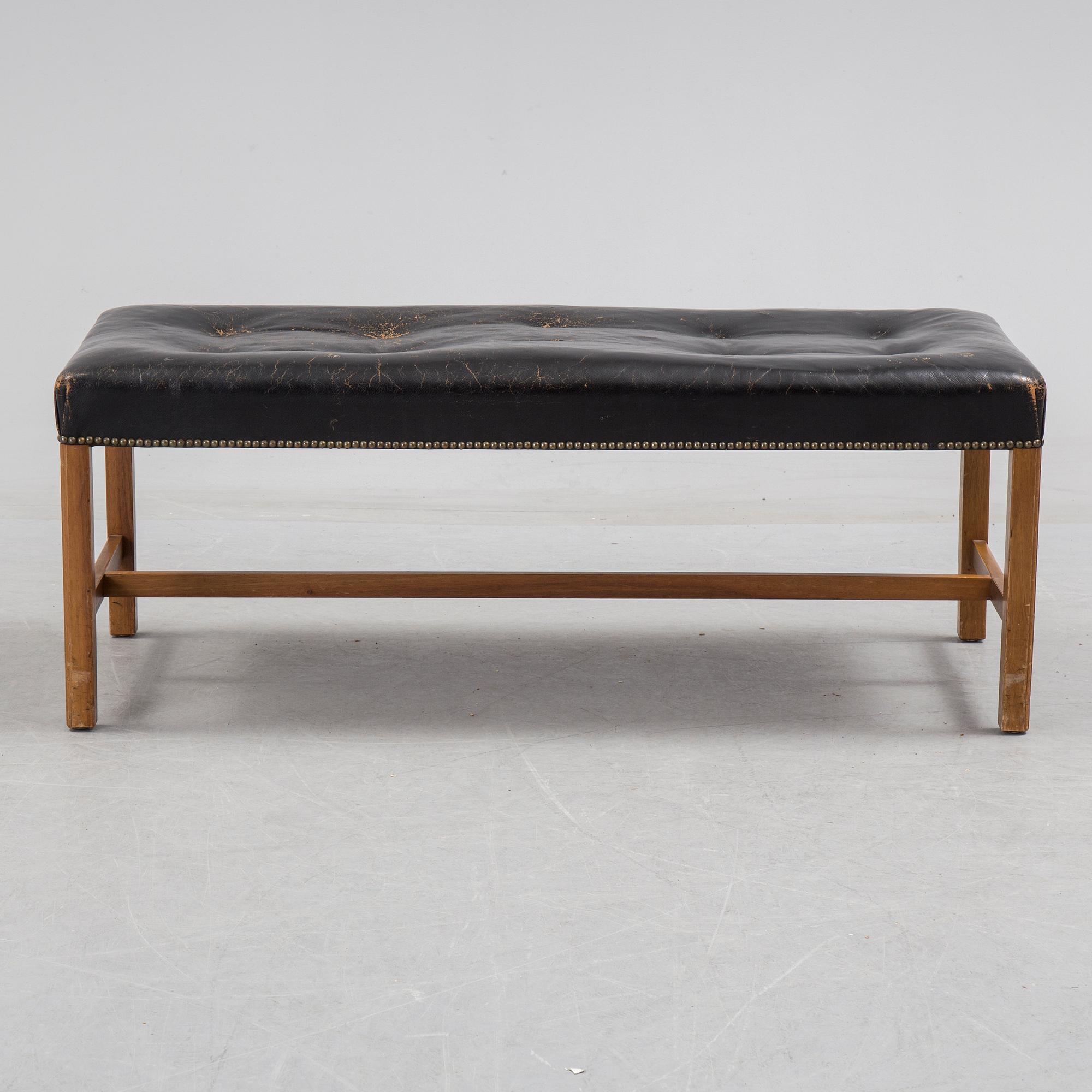 JOSEF FRANK, leather stool/bench, Firma Svenskt Tenn, model 2082.