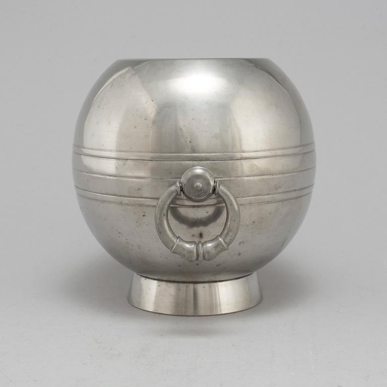 A 1935 pewter wine cooler by GAB.