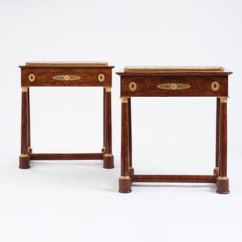 A pair of French Empire gilt bronze-mounted mahogany jardinieres, first half of the 19th century.