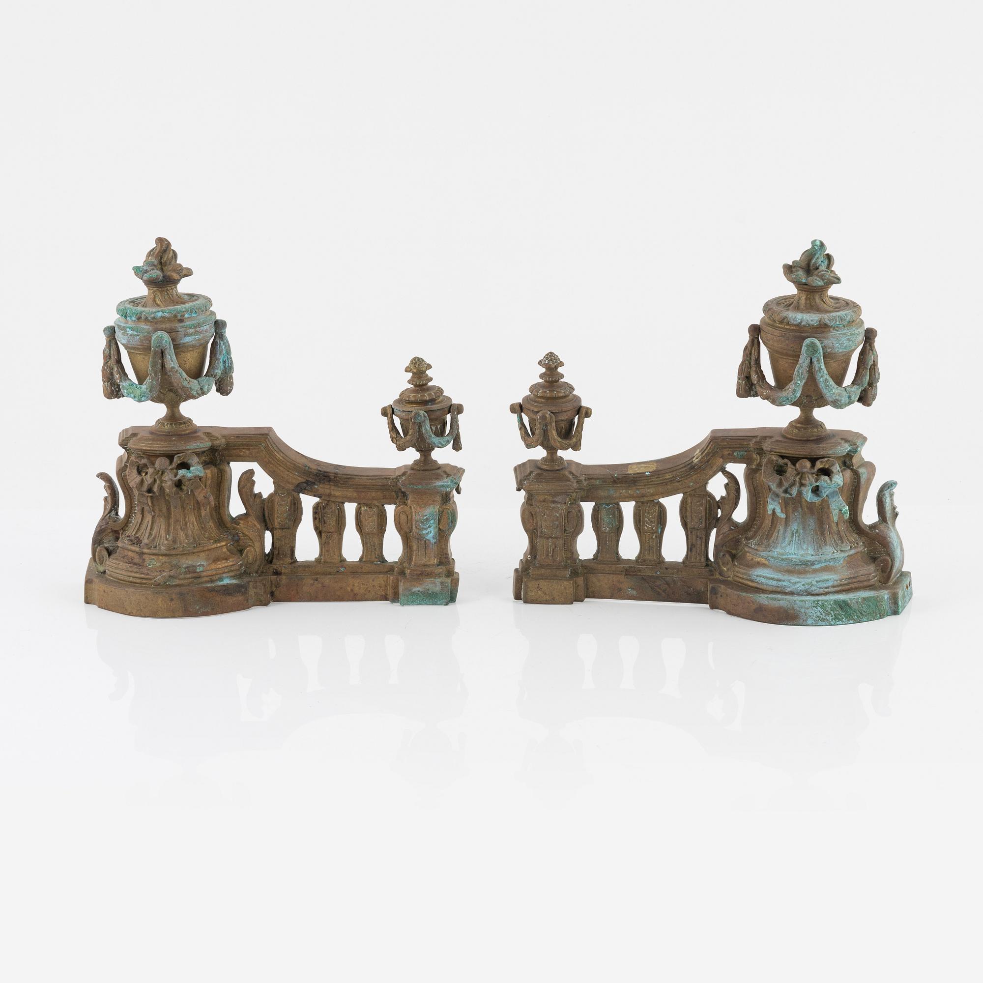 A Louis XVI style bronze grate, 19th Century.
