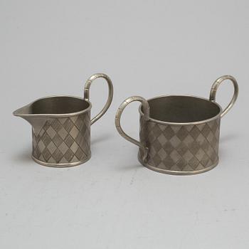 FIRMA SVENSKT TENN, a pewter sugarbowl and creamer Model nr 170, Stockholm 1927.