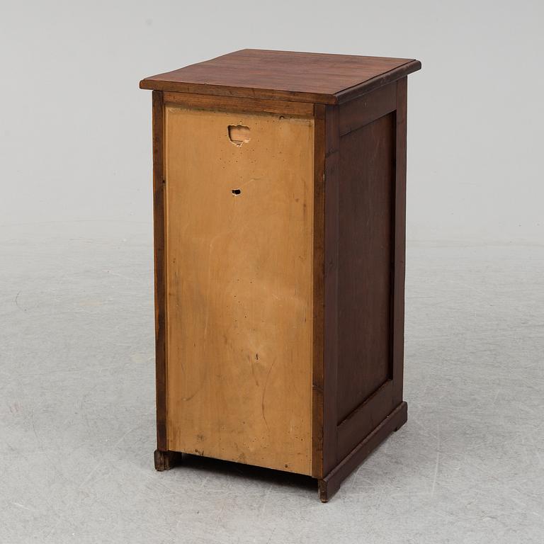 An early 20th Century stained pine office furniture.