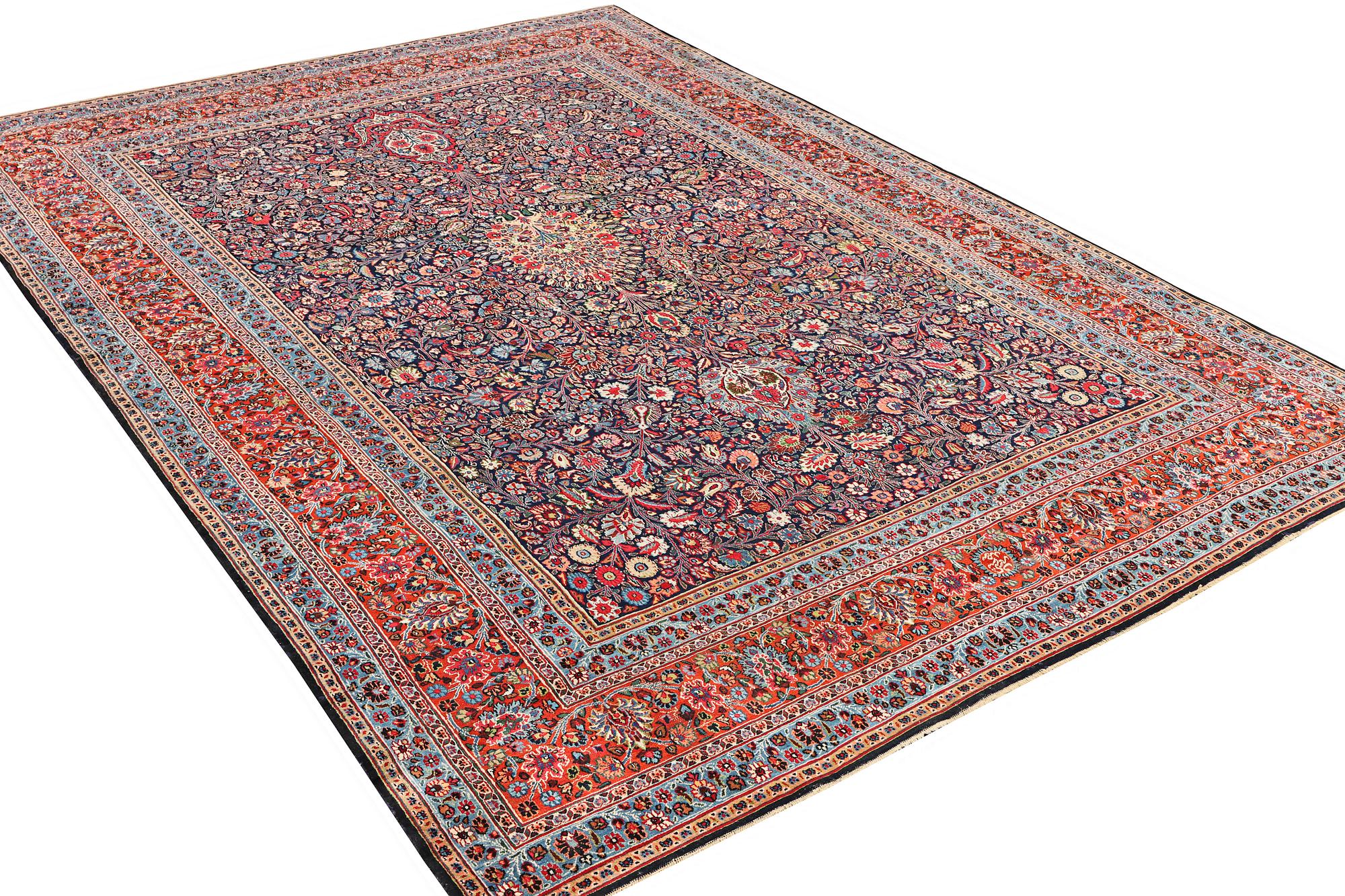 A semi-antique Meshad carpet, a. 360 x 252 cm.