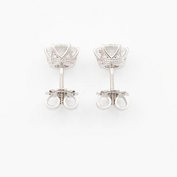 Earrings, single-stone earrings in 18K white gold with brilliant-cut diamonds, accompanied by IGI report.