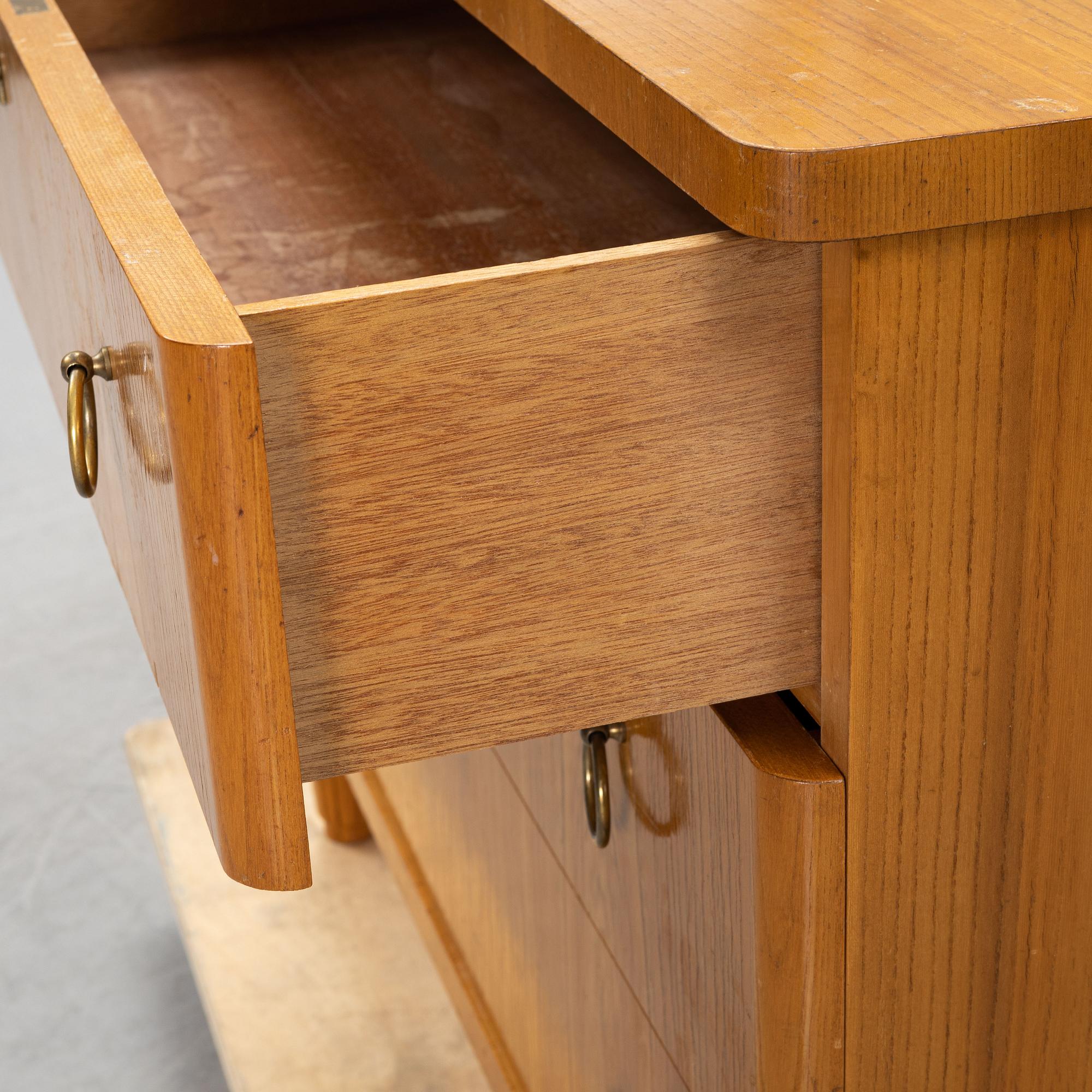 An elm wood veneered dresser, mid 20th Century.