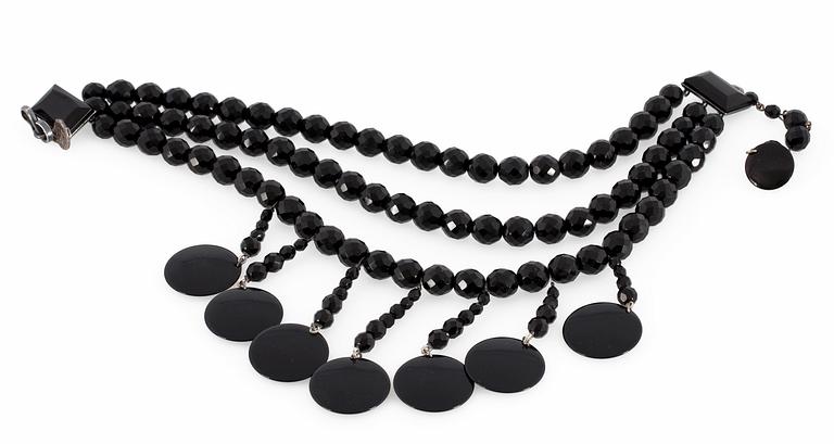 An Yves Saint Laurent necklace.