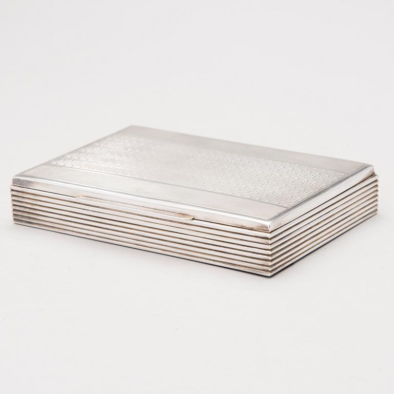 A cigarette case in silver, Dutch import mark ZII.