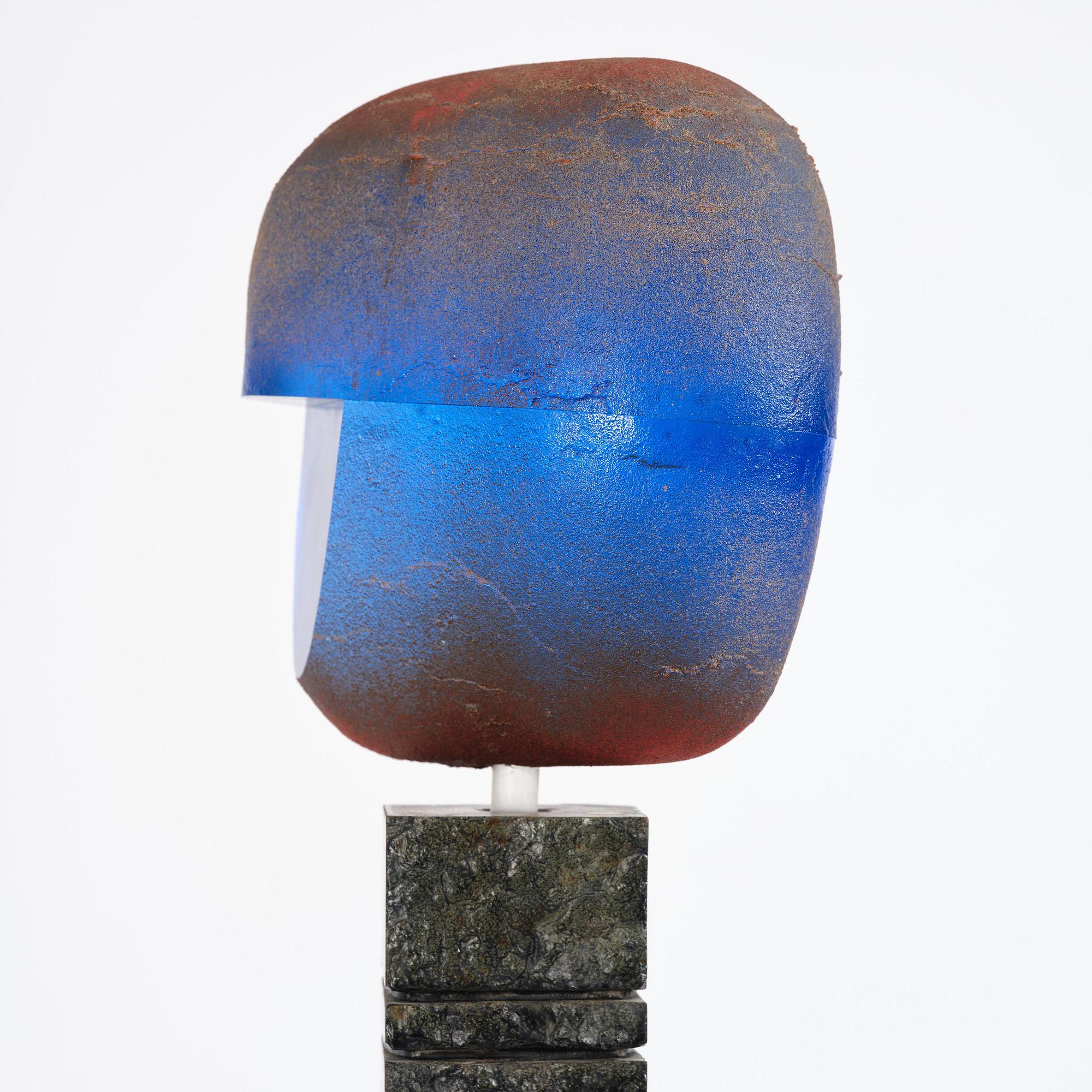 Bertil Vallien, a unique sand-cast glass sculpture of a head, on a high pedestal of polished limestone, Kosta Boda.