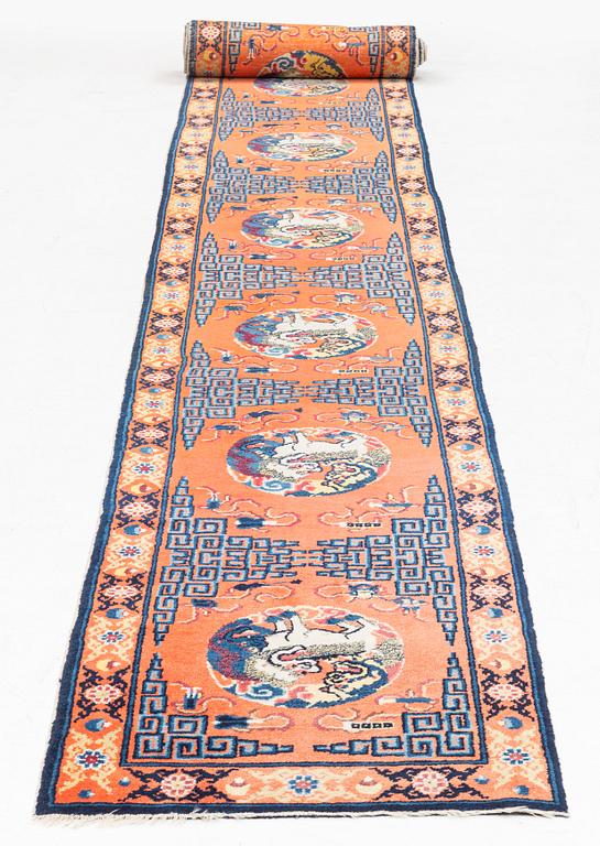 An antique Ningxia runner, north west China, c 763 x 72 cm.