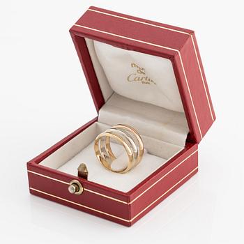 An 18K gold Cartier ring.