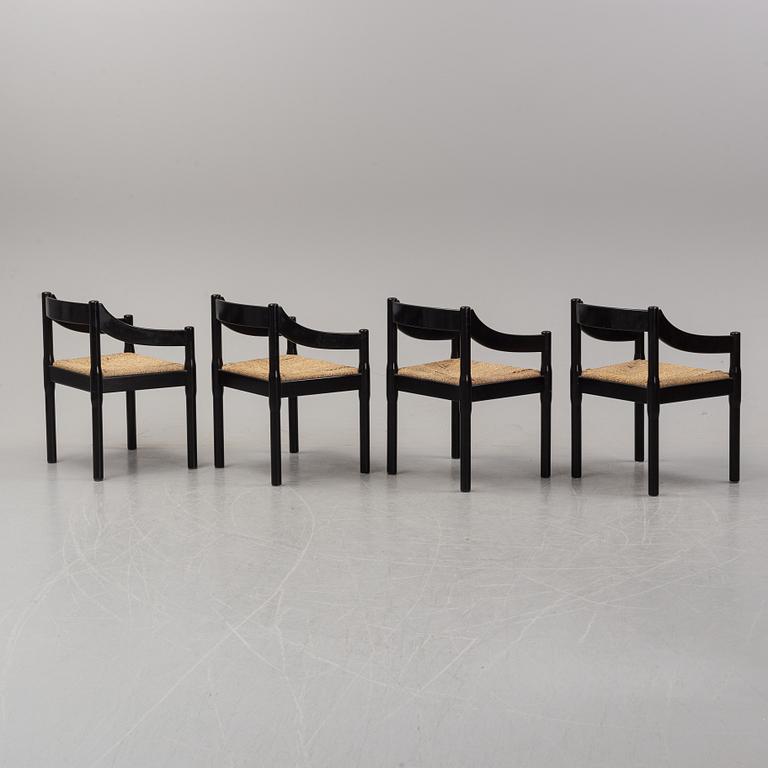 Vico Magestretti. Four black lacquered chairs with rope seats, "Carimate". Cassina, Italy.