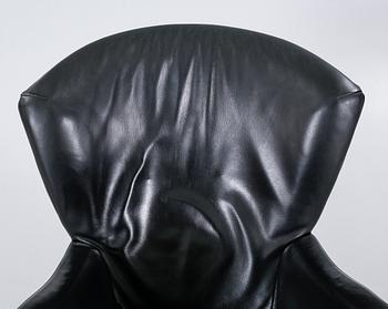 A lounge chair with foot stool by Gijs Papavoine for Montis, model "Castor", late 20th century.