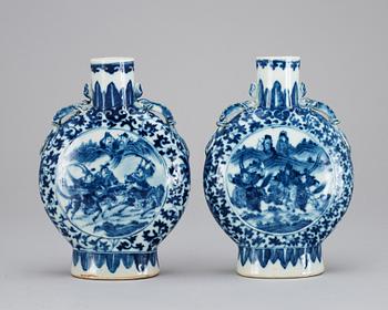 Two blue and white moon flasks, late Qing about 1900.