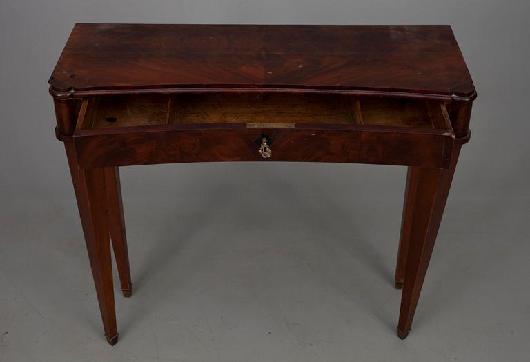 SPEGEL samt KONSOLBORD, mahognyfanerade, 1800-talets mitt.